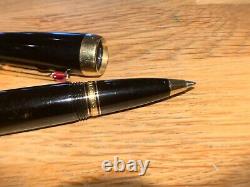 Mont Blanc Boheme Black Ballpoint Gold Trim and Ruby clip with Carry case